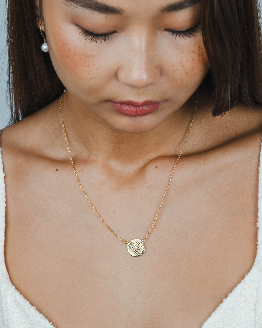 Golden Pearl Embrace Necklace