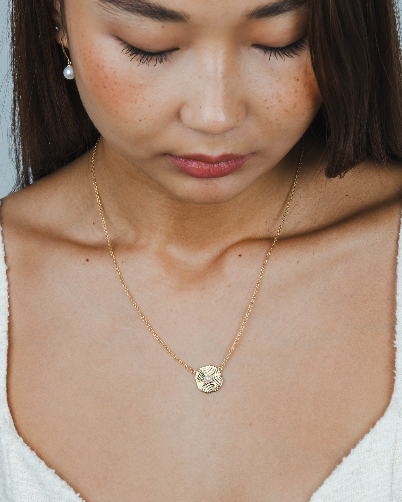Golden Pearl Embrace Necklace