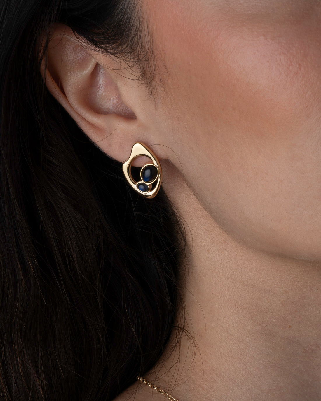 Ohrringe mit niedergeschlagenen Tropfen