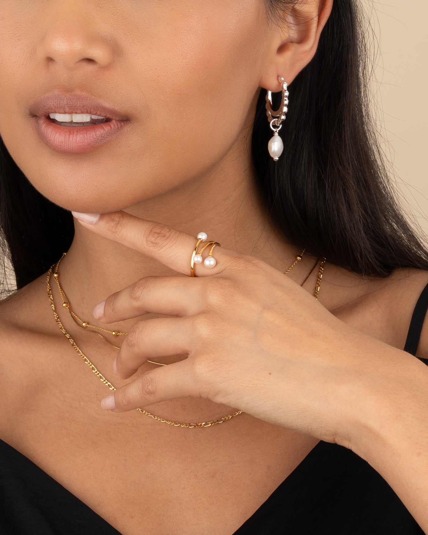 Tautropfen aus Perlenohrringen