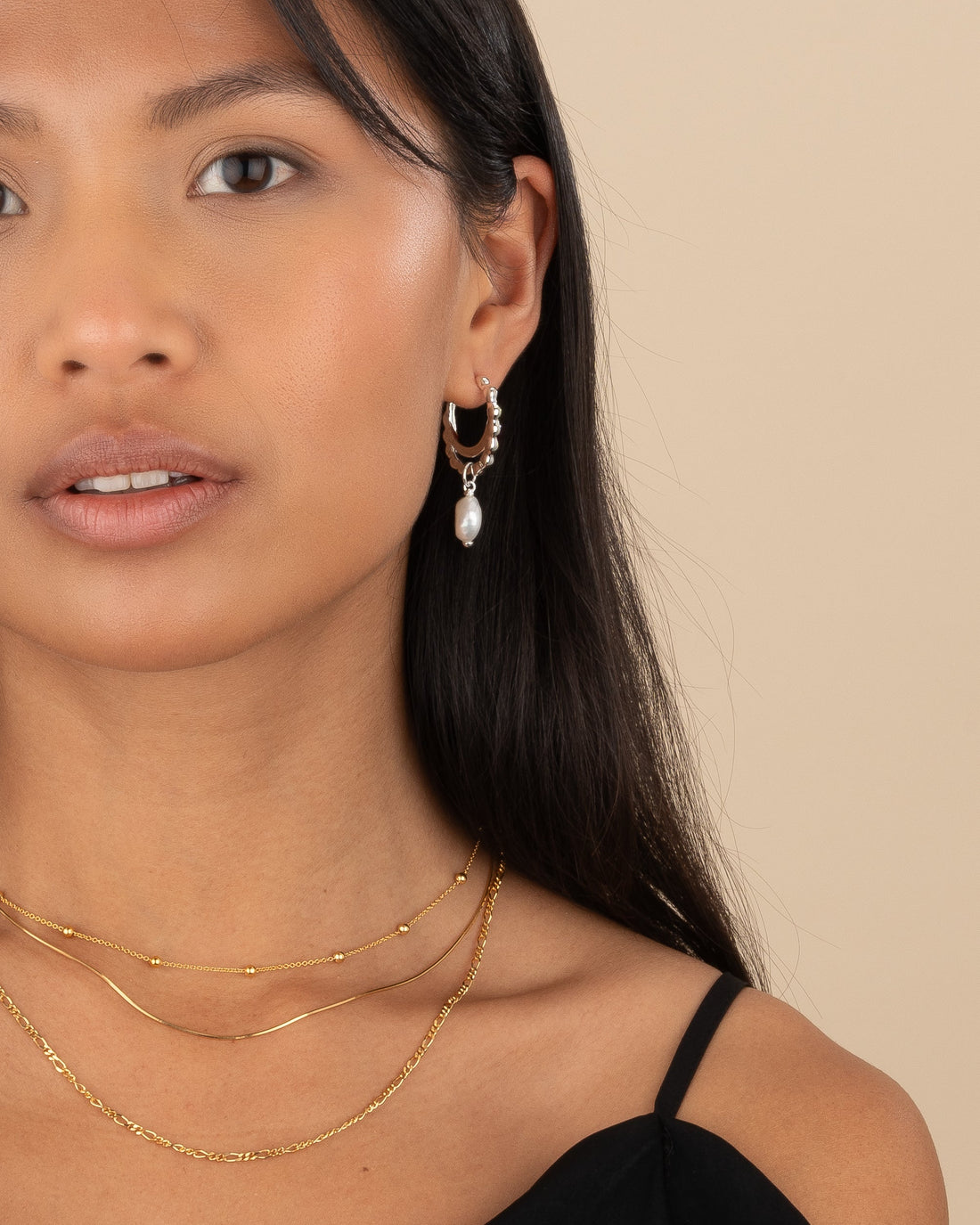 Tautropfen aus Perlenohrringen